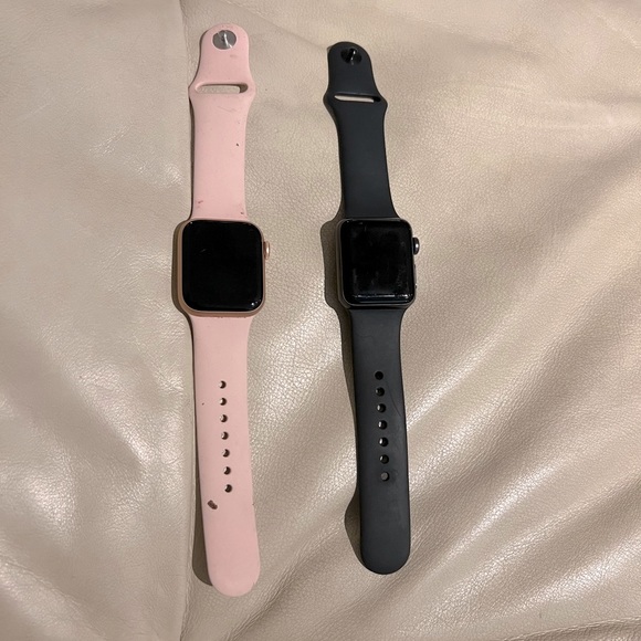 Two Apple watches for sale. The pink one is a series 7 Black one is series 3